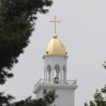 Cross and dome gilded with 23.75K gold leaf for St Peter's Montgomery, IN